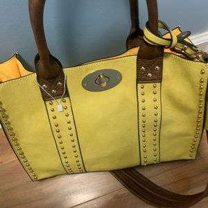 Vintage empire bag new with out tags never worn . Mustard yellow in color
